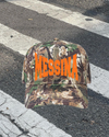CLUBHOUSE CAMO TRUCKER HAT